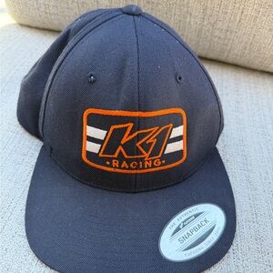 The Classic Navy Blue Black K1 Racing Flat Bill Hat Cap